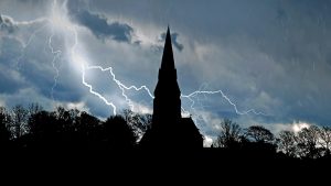 Photo of church and lightning