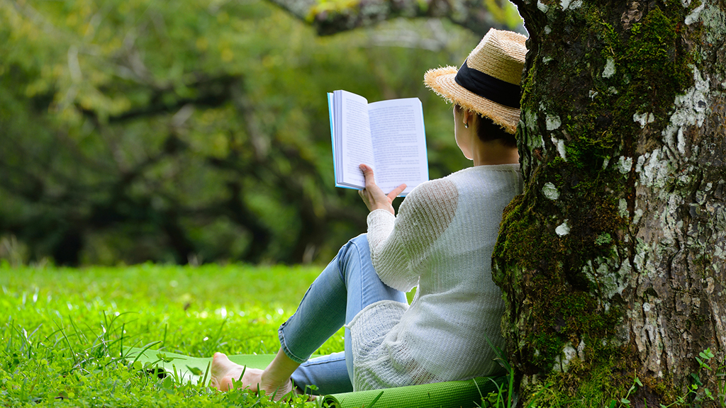 Photo of woman reading a book