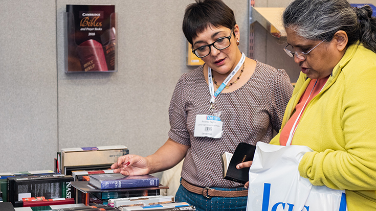 Photo of people with books