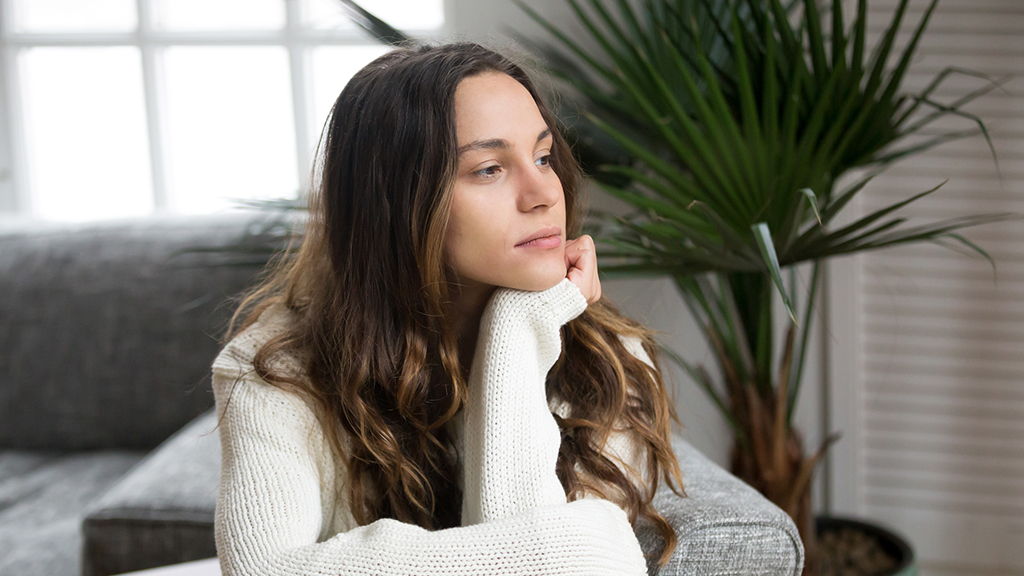 woman looking thoughtful